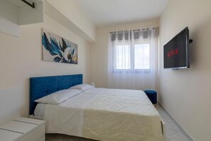 2 dormitoris, planxa i posts de planxar, wifi i roba de llit 