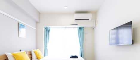 1 slaapkamer, een strijkplank/strijkijzer, wifi, beddengoed