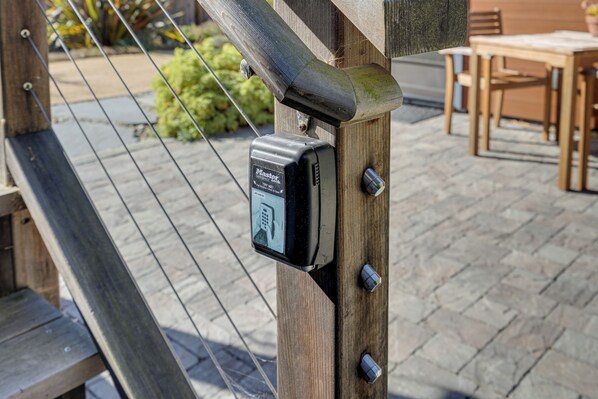 A security device attached to a wooden post. - 'little House By the Sea': Steps to Surfers Beach! (Half Moon Bay)