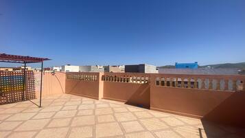 Tomannsrom – classic, utsikt mot bukt | Terrasse/patio