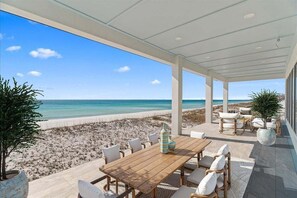Outdoor dining - The Grand Pearl 11 Bedroom Home (Pensacola Beach)