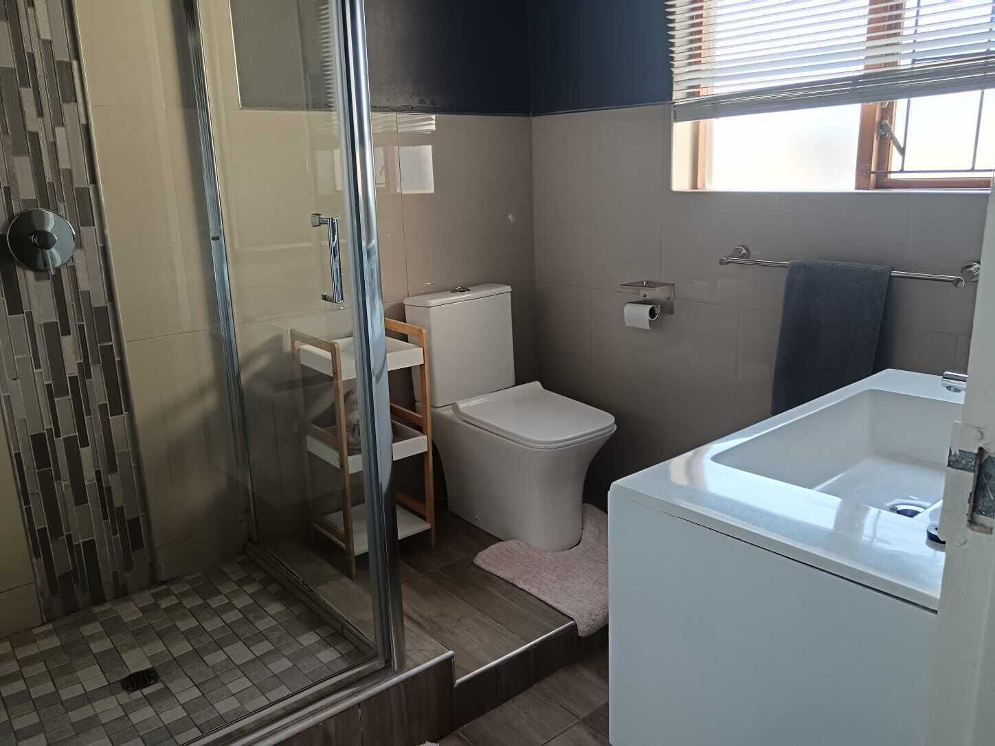 Deluxe Apartment, Patio, Garden View | Bathroom | Shower, towels, soap, shampoo