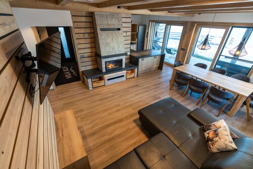 Vila Klif, a spacious vacation home near the ski slopes with a sauna and patio.