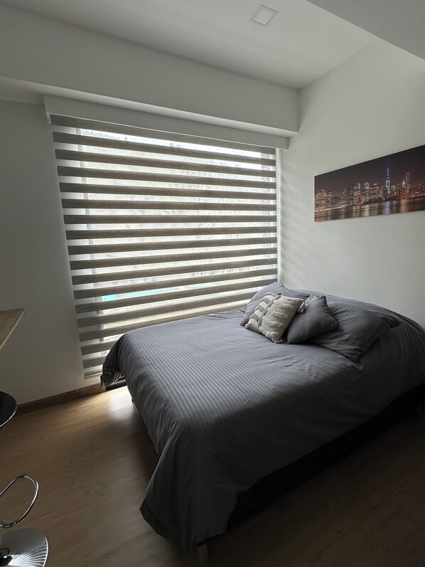 1 habitación, tabla de planchar con plancha, wifi y ropa de cama 