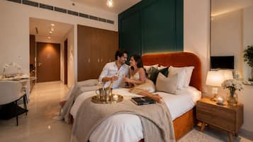 Deluxe Studio | Premium bedding, memory-foam beds, in-room safe, blackout curtains
