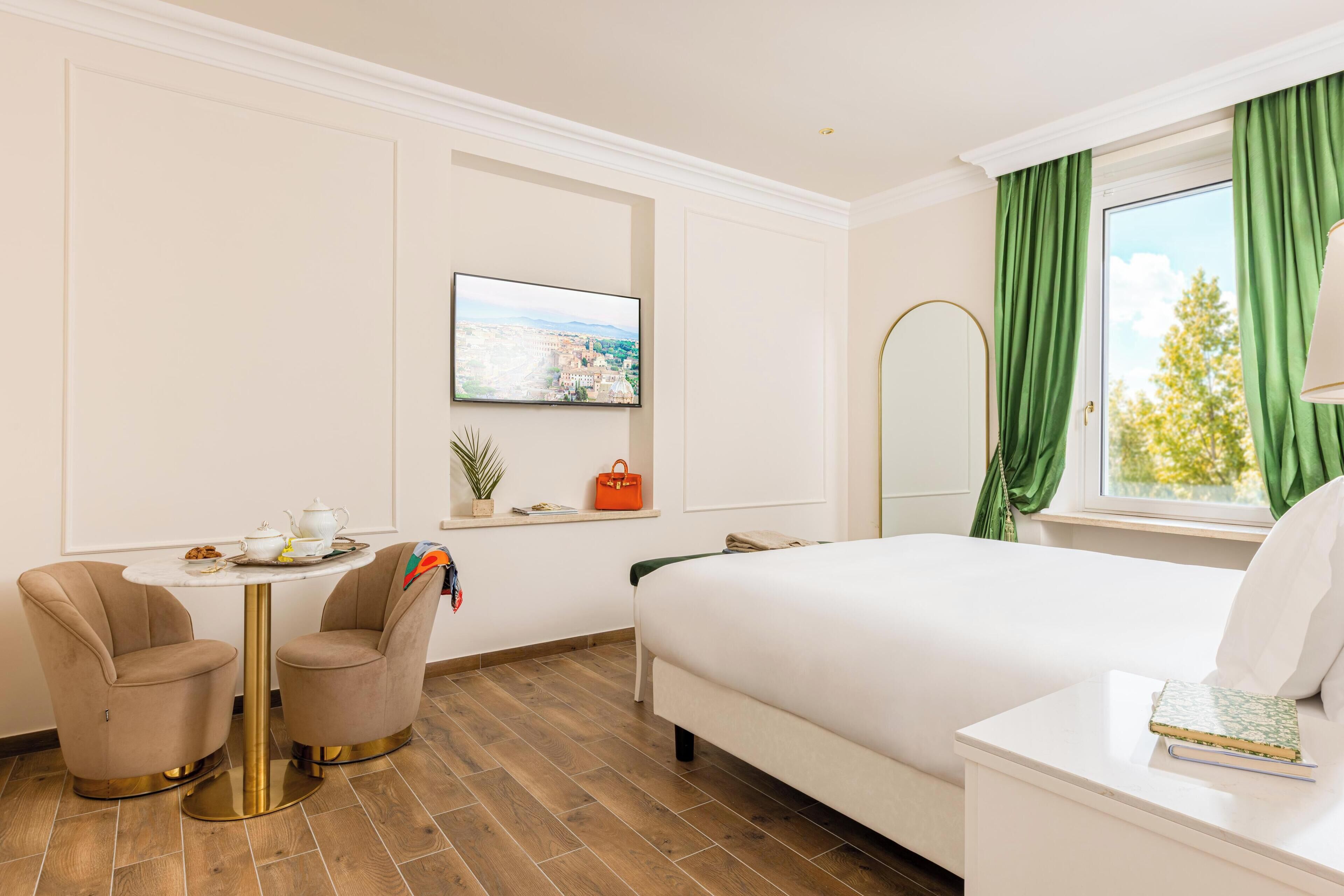 Suite Junior | Coffre-fort, accès au Wi-Fi (inclus), literie fournie