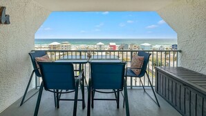 A balcony with a view of the beach and ocean. - 1BR/1B~sleeps 4~Boat Parking~Pool~Pickleball! (Gulf Shores)
