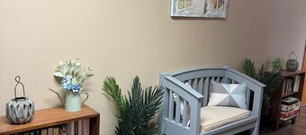 Cozy 1-bedroom suite in quaint Hartley with fireplace, coffee bar, outdoor area.