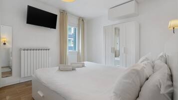 2 dormitorios, tabla de planchar con plancha, wifi y ropa de cama