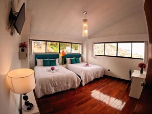 Family Suite, 4 Bedrooms, City View | Desk, laptop workspace, free WiFi, bed sheets