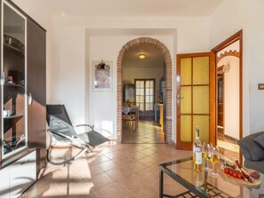 Apartment, 3 Bedrooms, Patio, Garden View | Living area - A Welcoming Ground-floor Accommodation (Porto Torres)