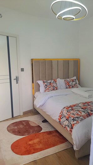 1 bedroom, iron/ironing board, WiFi, bed sheets - Secure Tatu City Haven with Ample Parking & Premium Amenities (Tatu City)