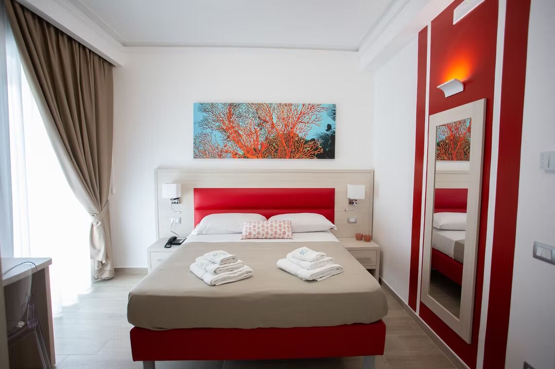 Superior Double Room, Sea View | Minibar, in-room safe, blackout drapes, free WiFi