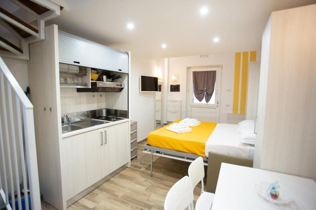 Estudio familiar, cocineta, vista al mar | Minibar, caja de seguridad en la habitación y cortinas blackout 