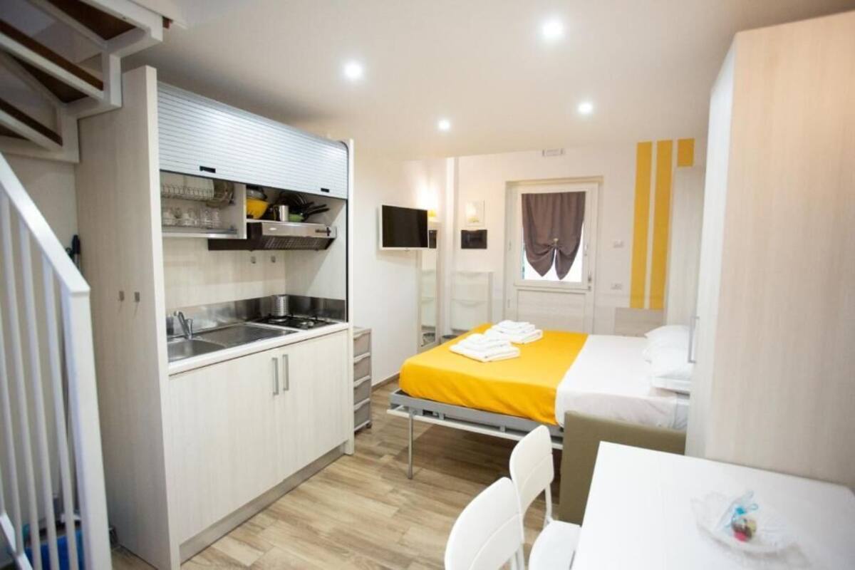 Family Studio, Kitchenette, Sea View | Minibar, in-room safe, blackout drapes, WiFi (free)