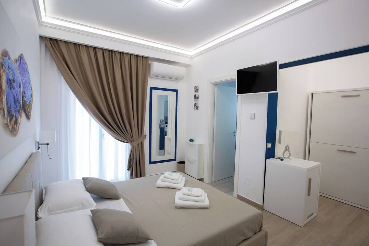 Comfort Quadruple Room, Hill View | Minibar, in-room safe, blackout drapes, WiFi (free)