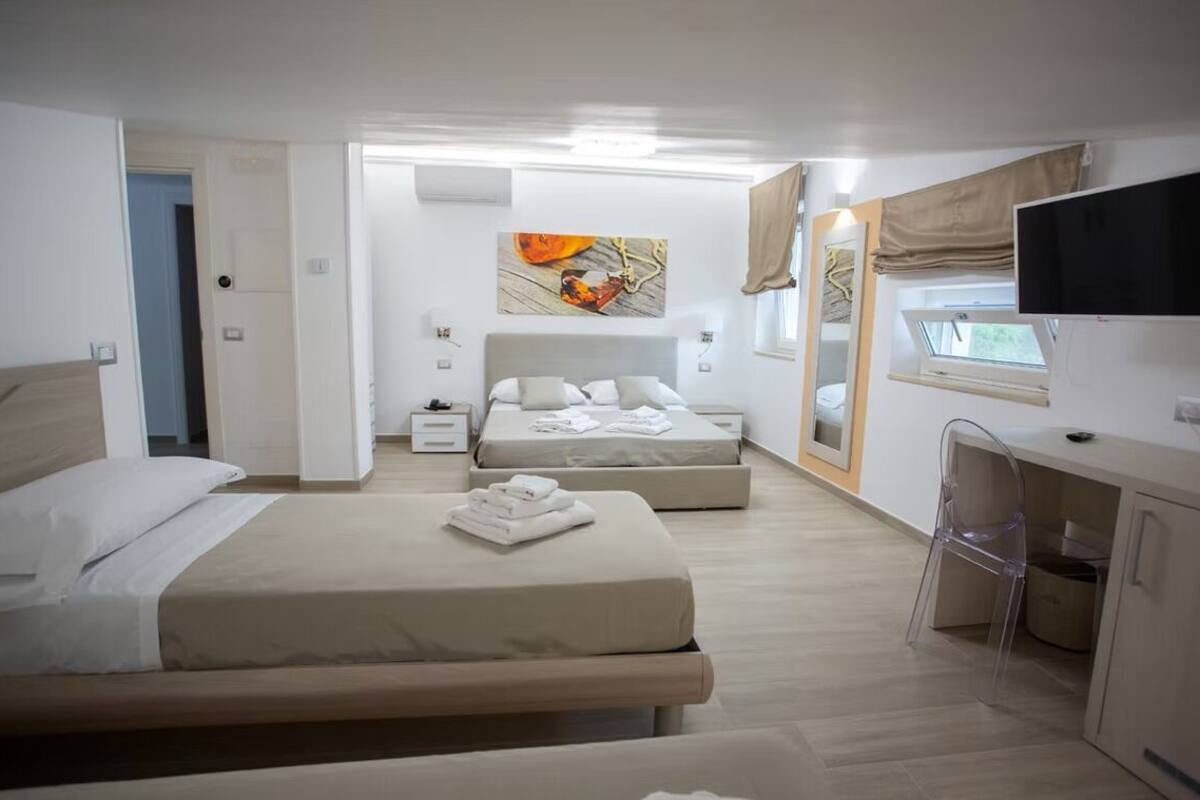 Standard Quadruple Room, Hill View | Minibar, in-room safe, blackout drapes, WiFi (free)