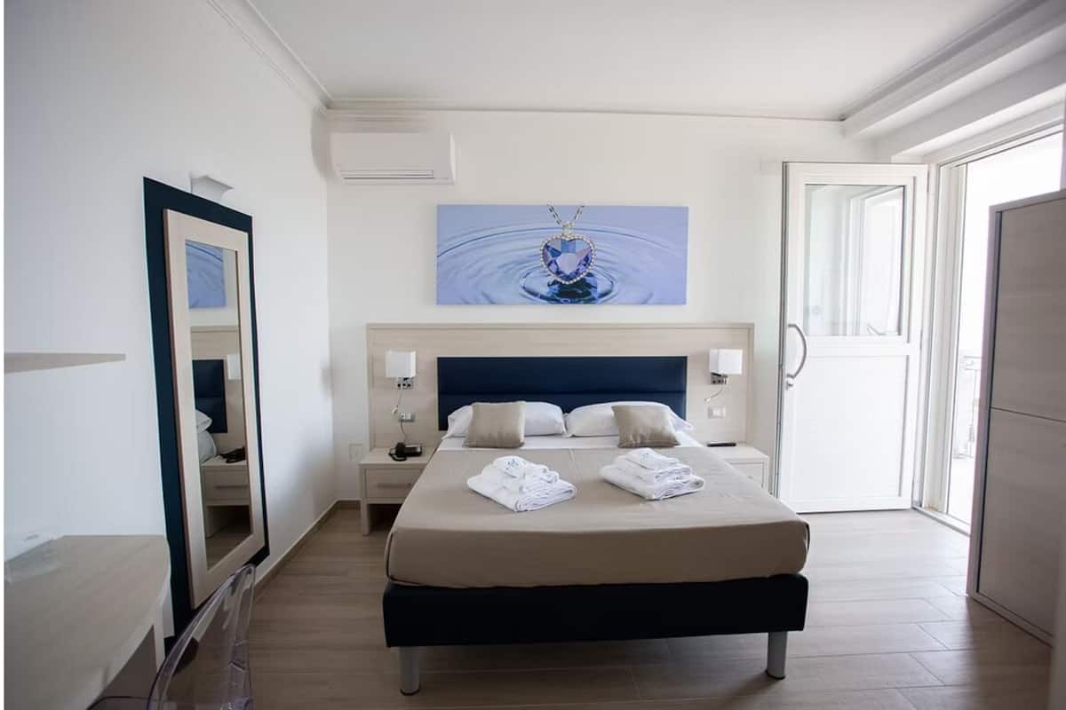 Superior Quadruple Room, Balcony, Sea View | Minibar, in-room safe, blackout drapes, WiFi (free)