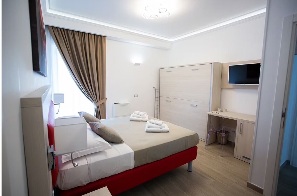 Family Room, Balcony, Sea View | Minibar, in-room safe, blackout drapes, free WiFi