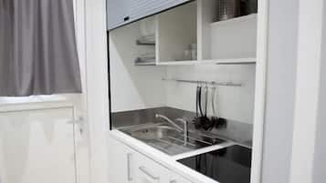 Family Room, Kitchenette | Minibar, in-room safe, blackout drapes, WiFi (free)