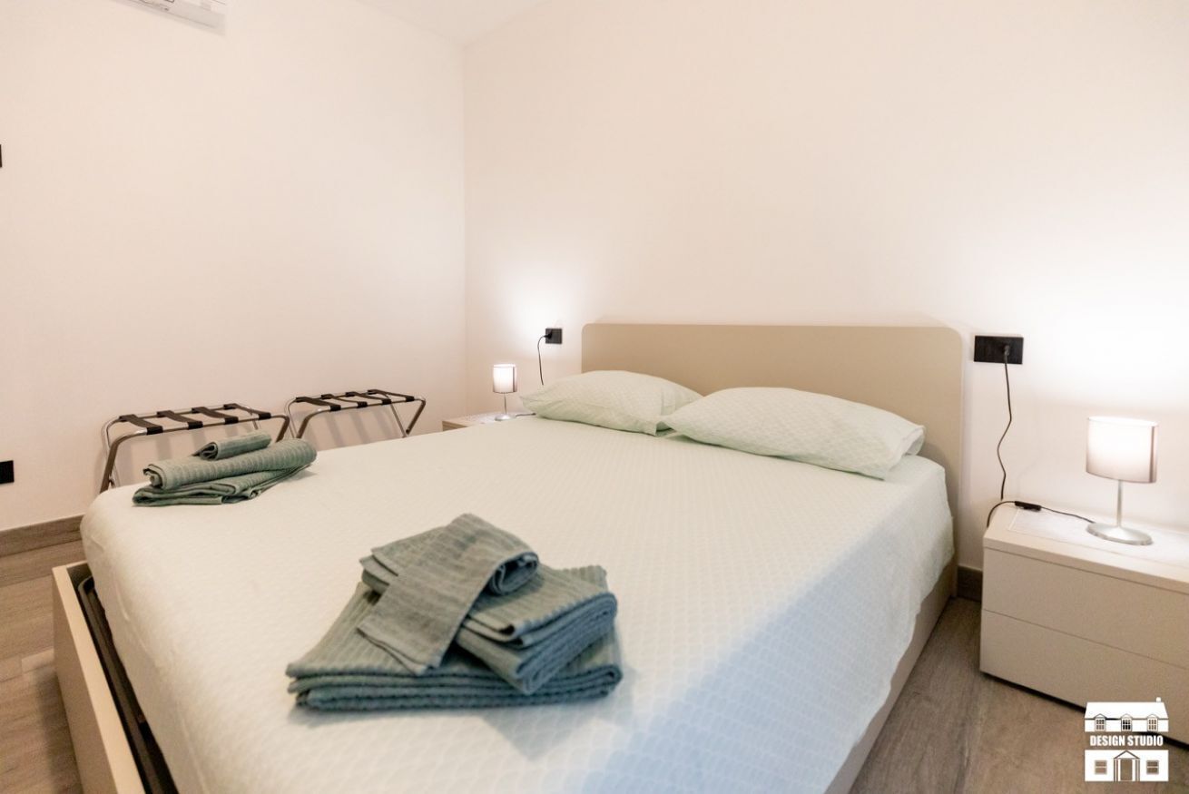 Fer et planche à repasser, lit parapluie