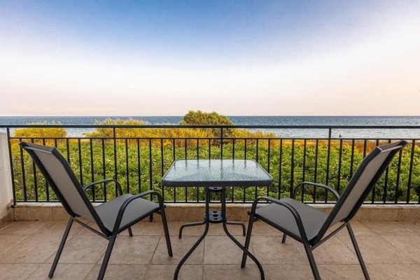 Private Balcony with Outdoor Seating and Open Views
