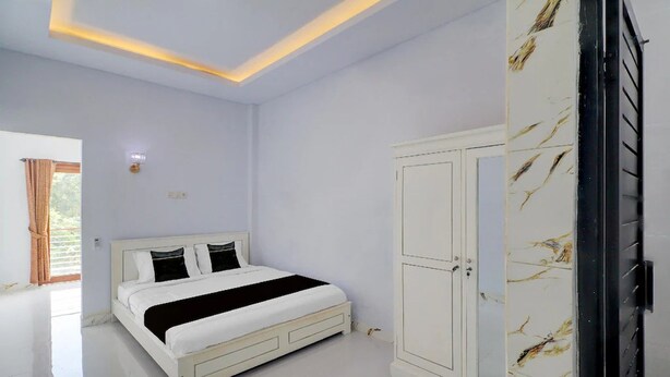 Kamar Double Standar | Seprai premium, meja kerja, Wi-Fi gratis, dan seprai linen