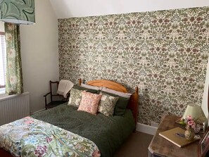 2 slaapkamers, een strijkplank/strijkijzer, gratis wifi, beddengoed