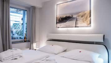 Apartemen, 1 kamar tidur | Brankas, meja kerja, ruang kerja ramah laptop, dan Wi-Fi gratis