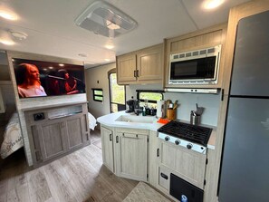 Private kitchen - Cozy 2-bedroom brand new trailer in quaint Whitewater with all amenities. (Whitewater)