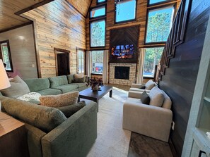 Living area - Pine Bridge Retreat - 3 Kings, Hot Tub, Playset, Firepit, Outdoor Kitchen, Games (Broken Bow)