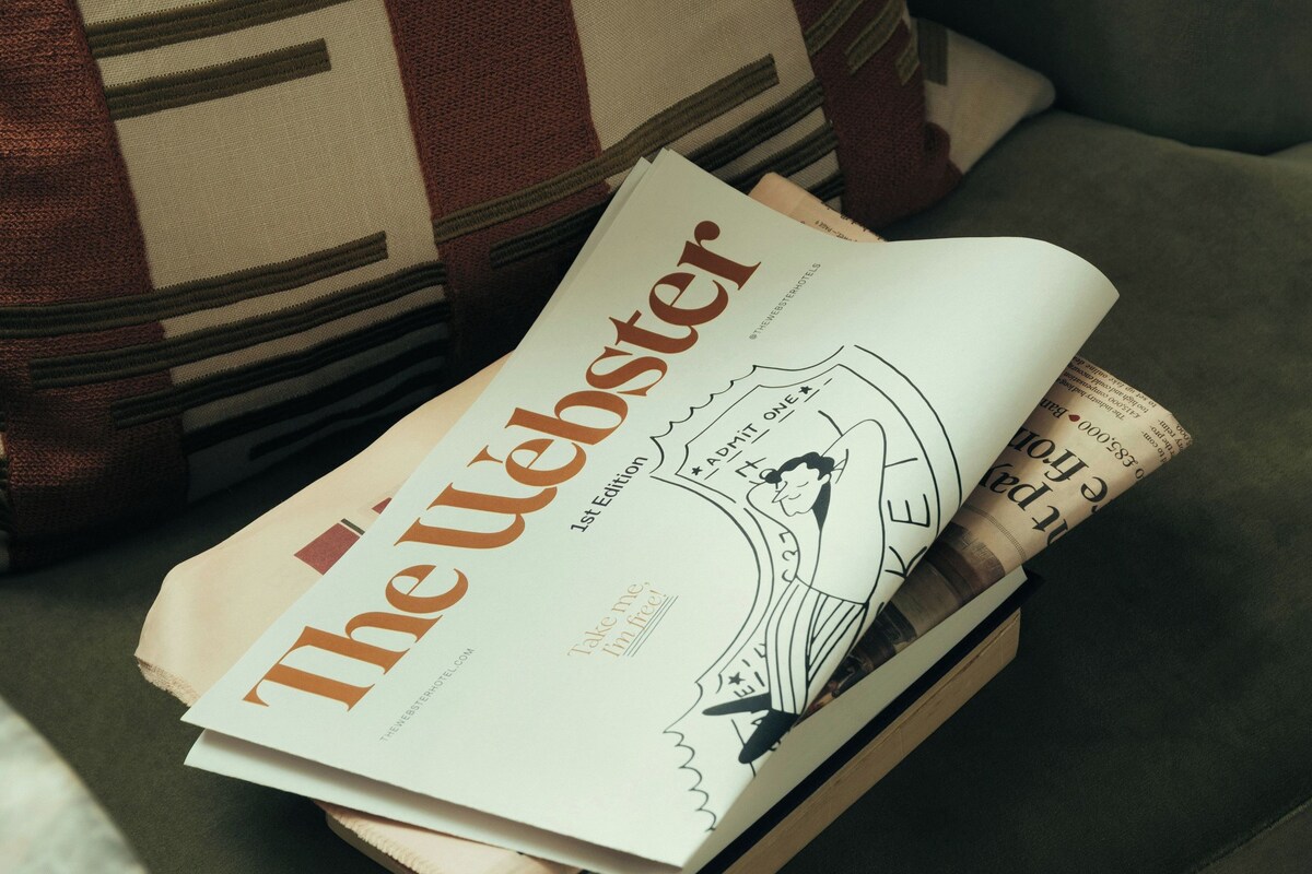 A magazine on a cushion.