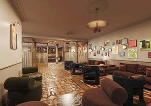A spacious lobby with a bar area, multiple seating options, and a variety of wall art.
