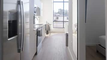 Studio (0 Bedroom) | Living area | 50-inch Smart TV with digital channels, table football