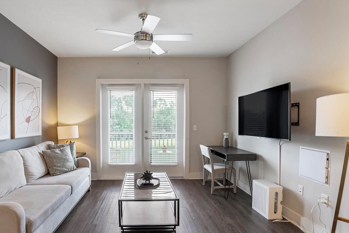 Apartment (2 Bedrooms) | Living area | 50-inch TV with digital channels