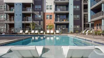 Seasonal outdoor pool, pool loungers