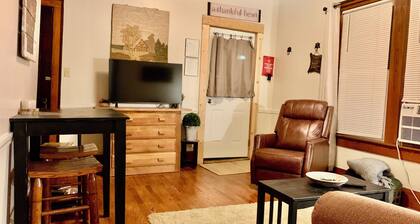 Alumni Cottage, right beside Harding campus