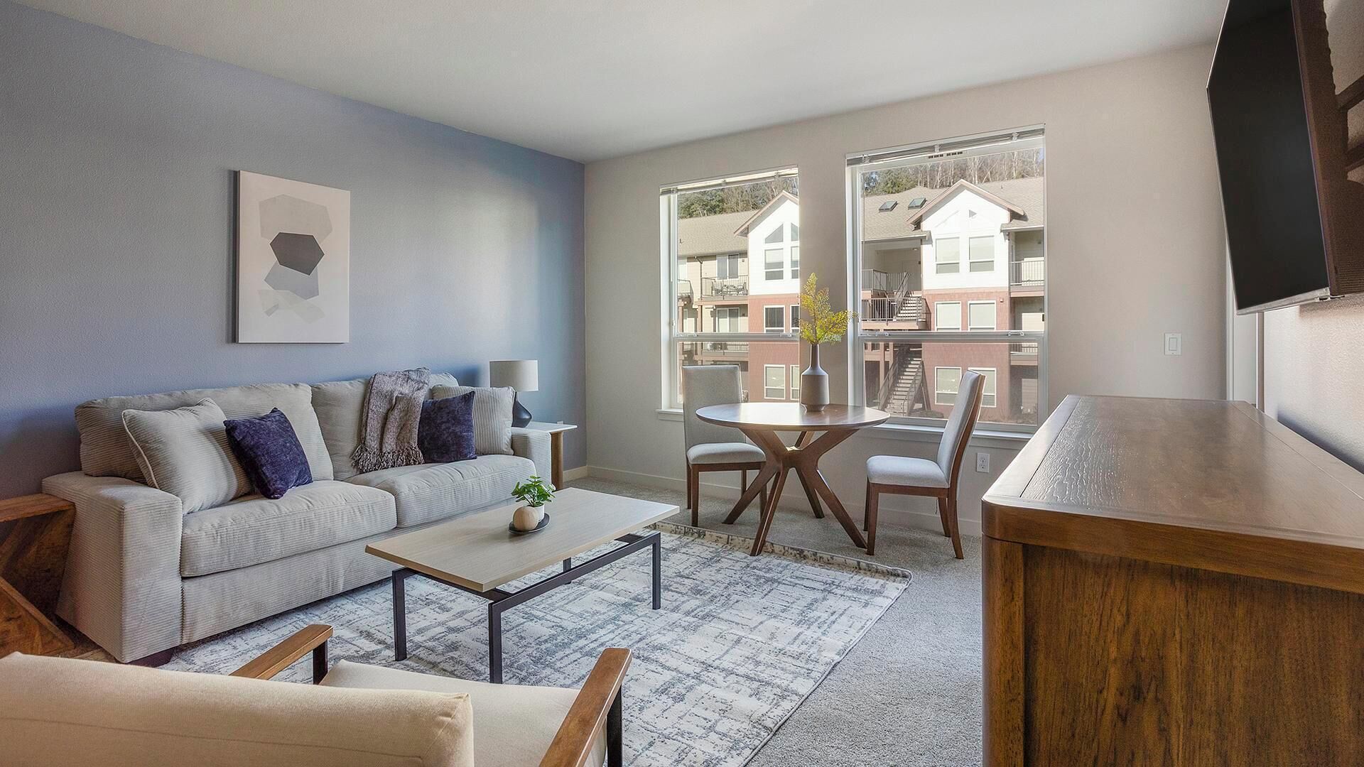 Apartment (1 Bedroom) | Living area | 50-inch TV with digital channels