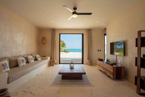 TV, DVD player, offices - Isla Blanca Beach House |3BR |Eco-friendly Retreat (Cancún)