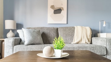 Apartment (1 Bedroom) | Living area | 50-inch Smart TV with digital channels