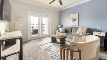 Apartment (1 Bedroom) | Living area | 50-inch Smart TV with digital channels