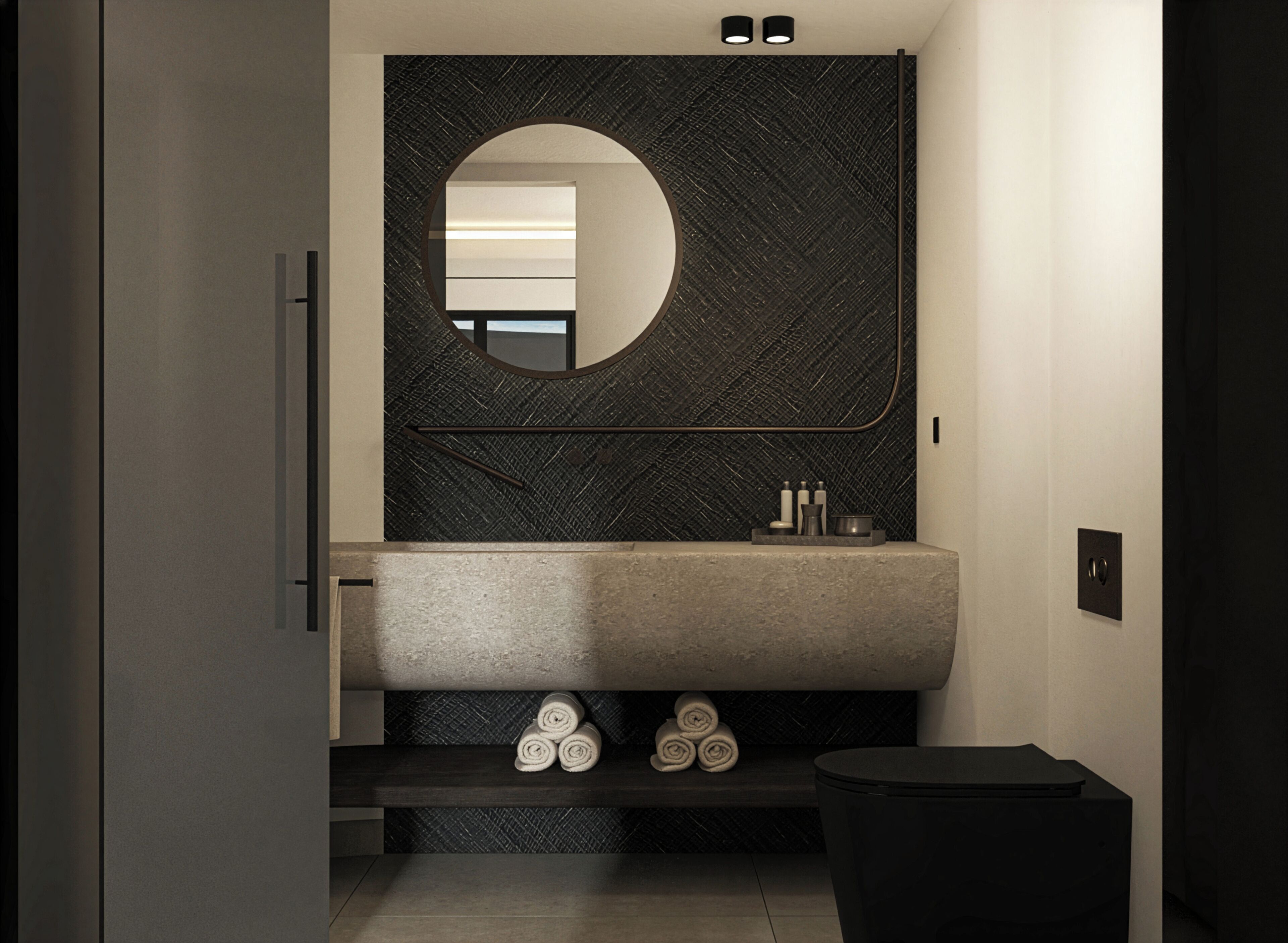 Une salle de bain moderne avec un grand miroir, un lavabo et des toilettes.