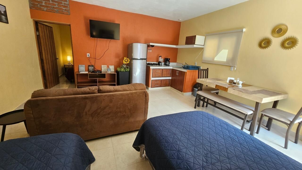 Suite Confort, baño privado | Zona de estar