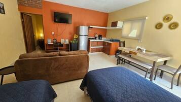 Suite Confort, baño privado | Zona de estar