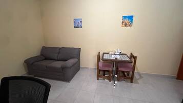 Suite Confort | Área de sala de estar