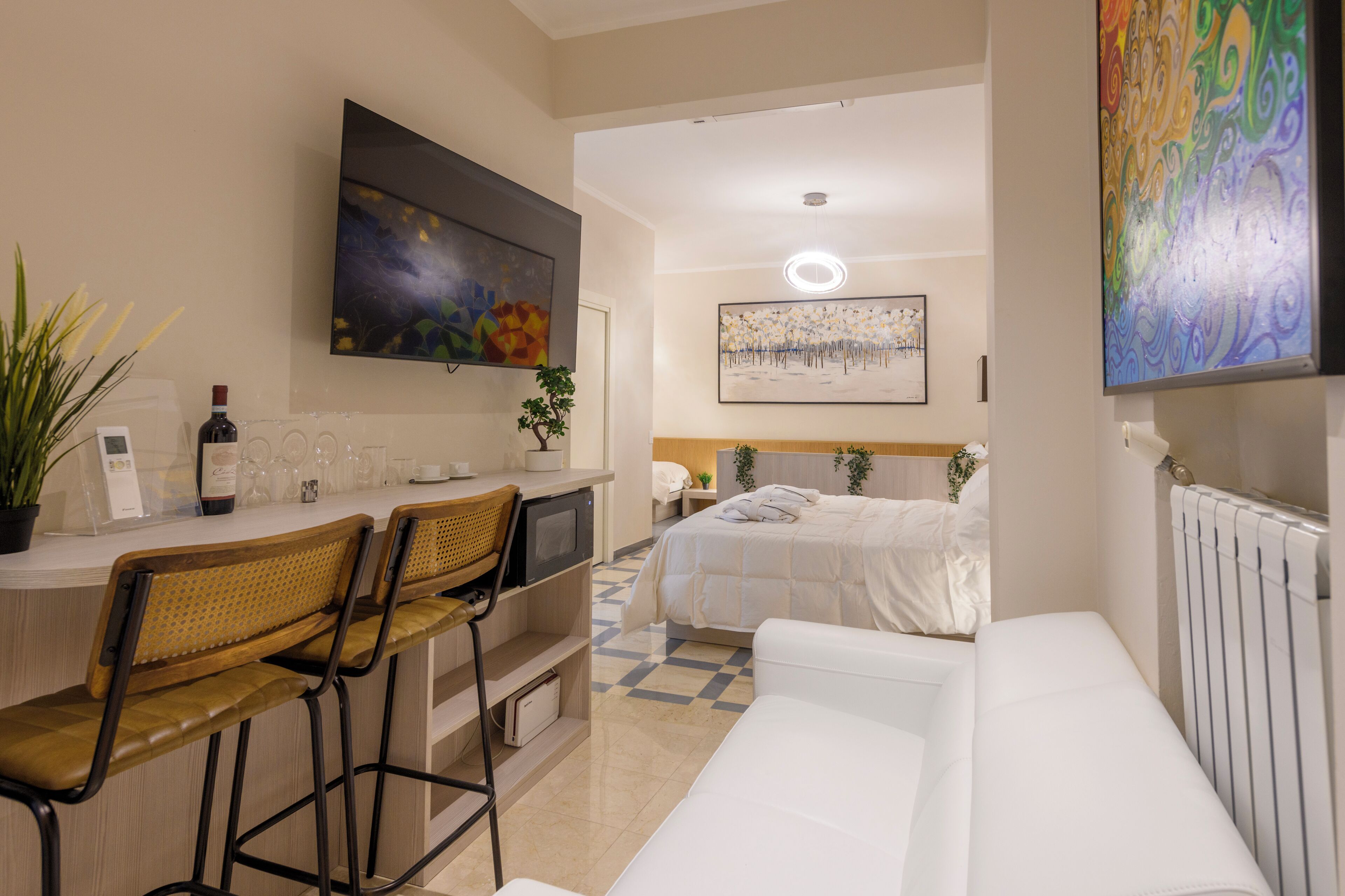 Luxury Quadruple Room, Courtyard View | In-room safe, desk, laptop workspace, blackout drapes
