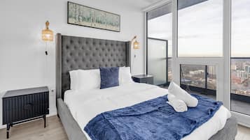 Luxury Suite, Multiple Beds, Non Smoking, City View | Blackout curtains, iron/ironing board, free WiFi, bed sheets