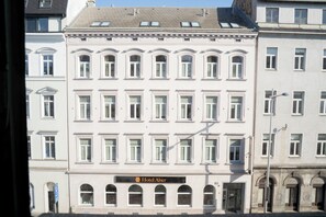 A multi-story building with a classic architectural style, featuring a prominent 'Hotel Alsser' sign at the ground level. - Hotel Alser (Vienna)