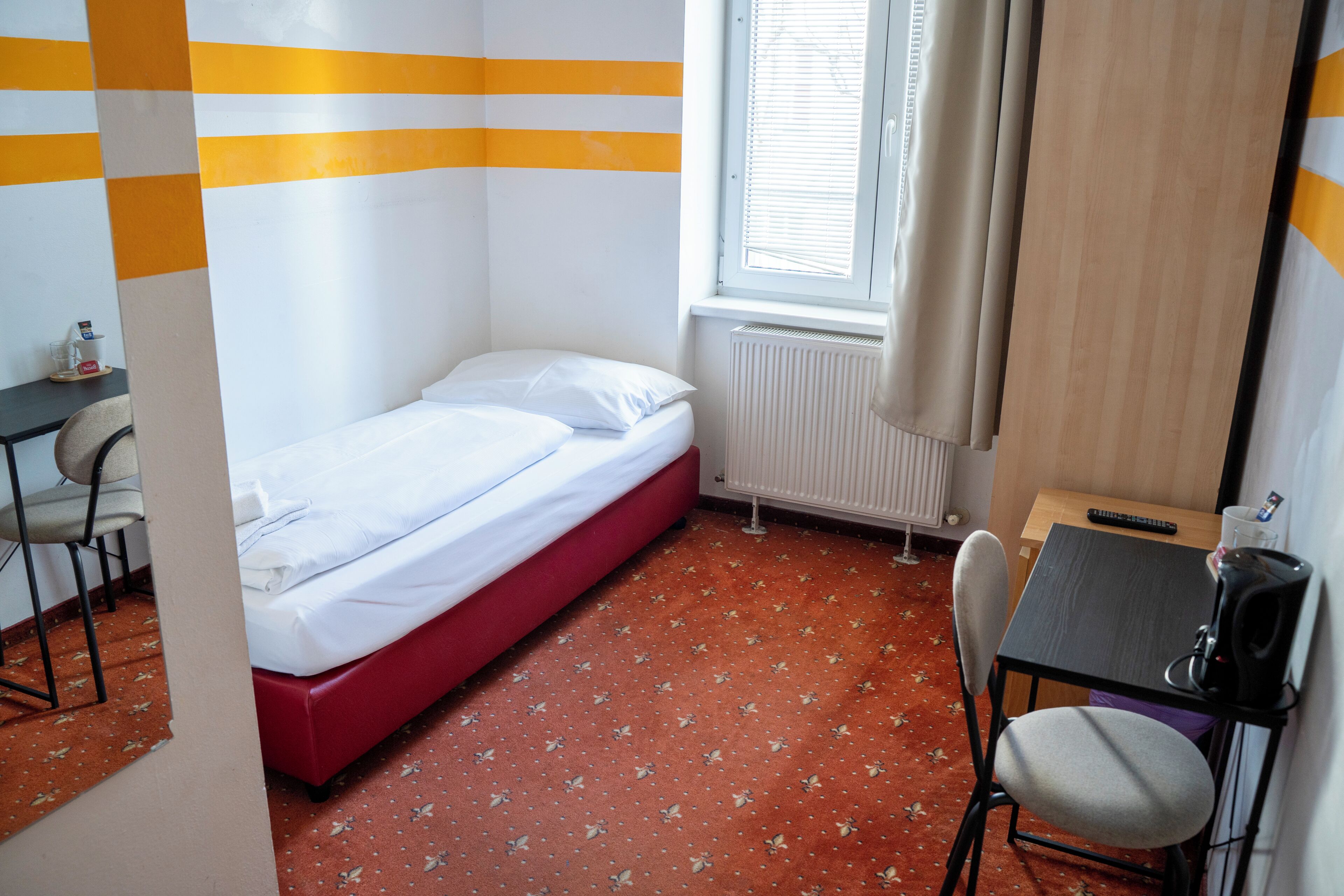Einzelzimmer | Kostenloses WLAN, Bettwäsche