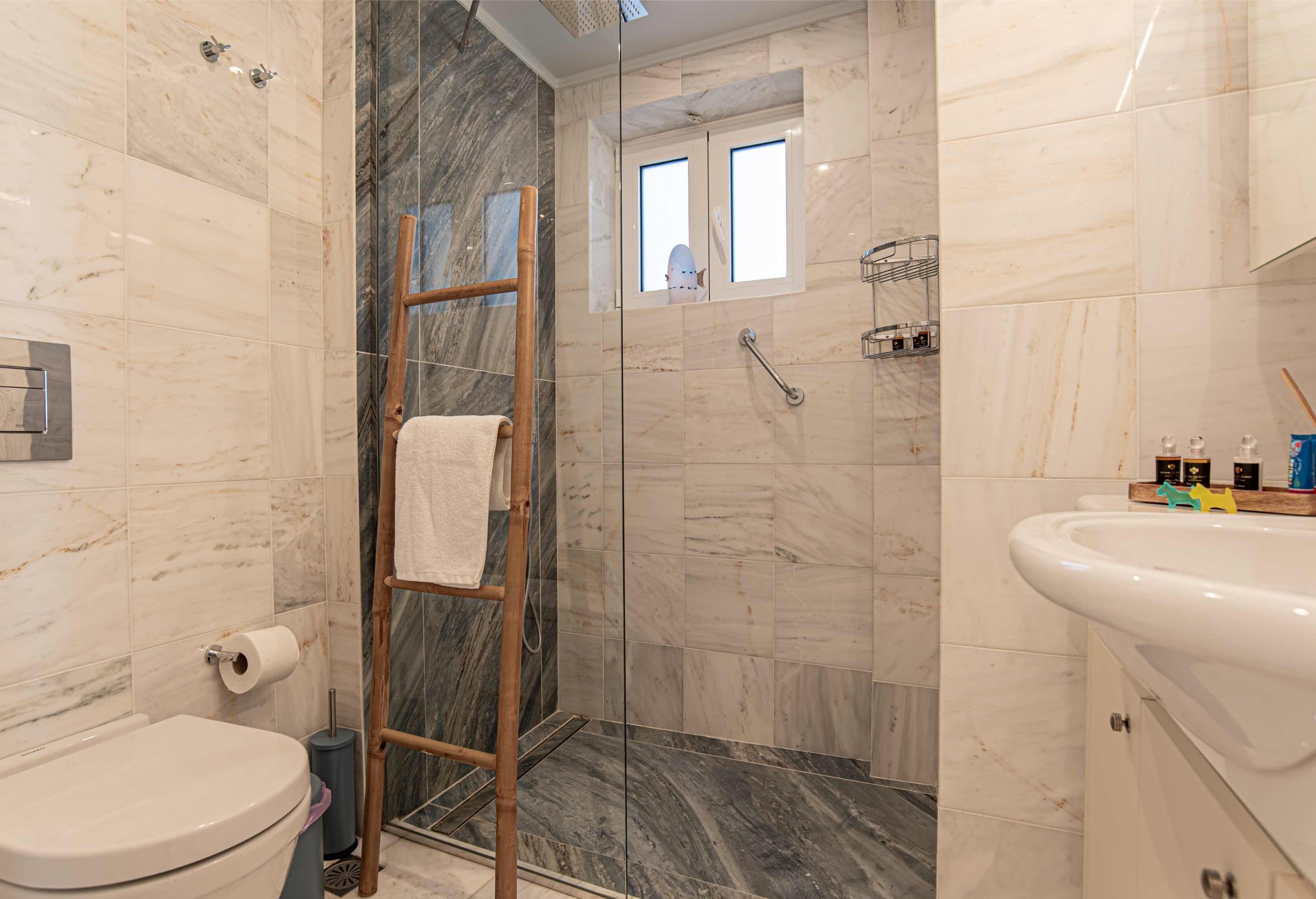Hair dryer, towels, soap, toilet paper